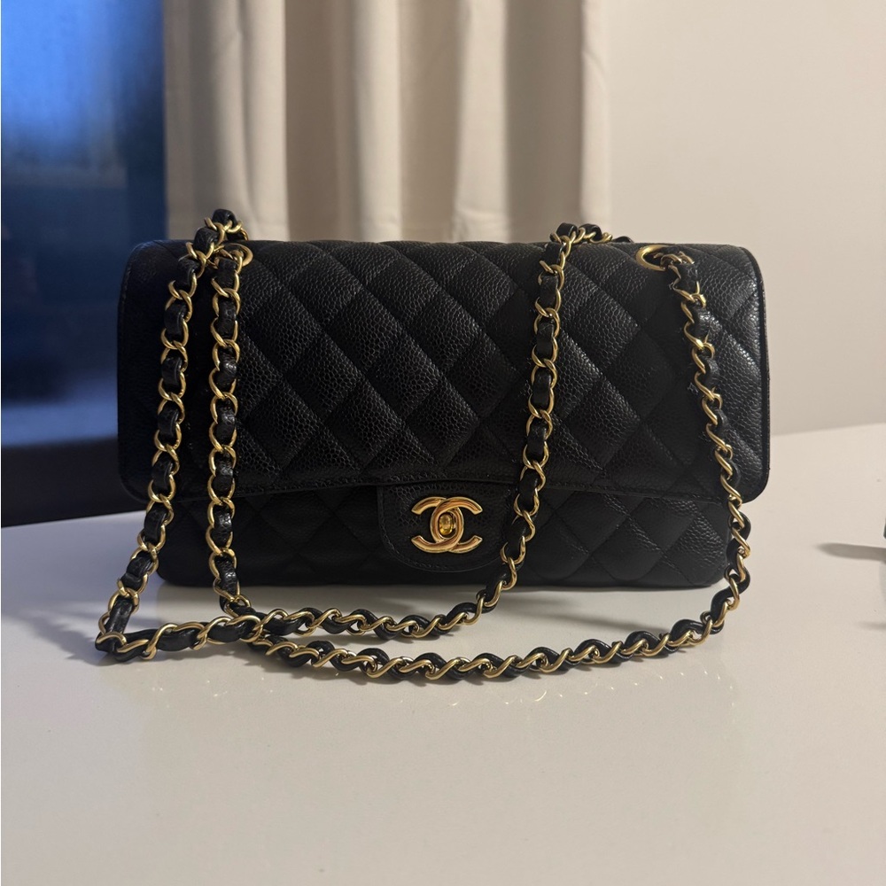 CHANEL medium, classic handbag and black caviar leather with gold hardware